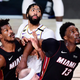 Jimmy Butler, left, was invited to the All-Star Game, but he said he turned it down because teammate Bam Adebayo (13) didn’t make it.